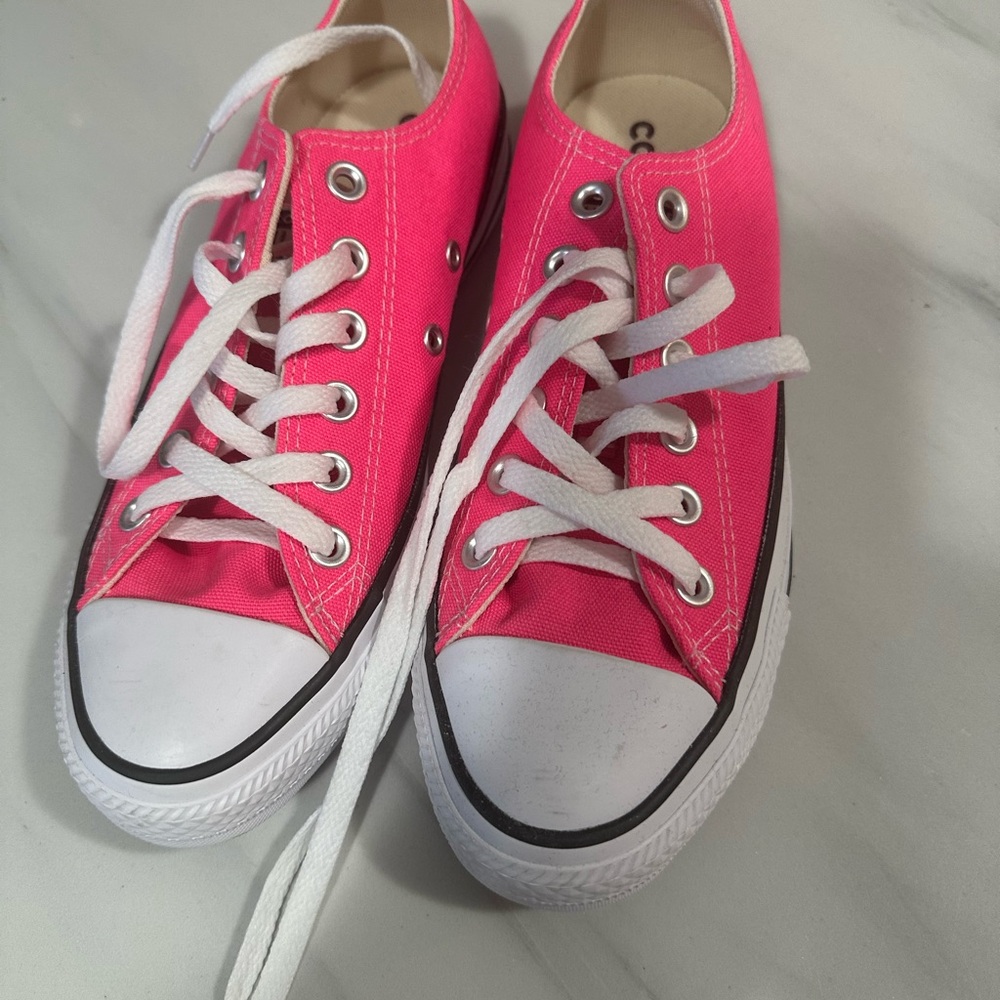 Pink Chuck Taylor’s Canvas Sneakers with White Laces. New and Never used. 7.